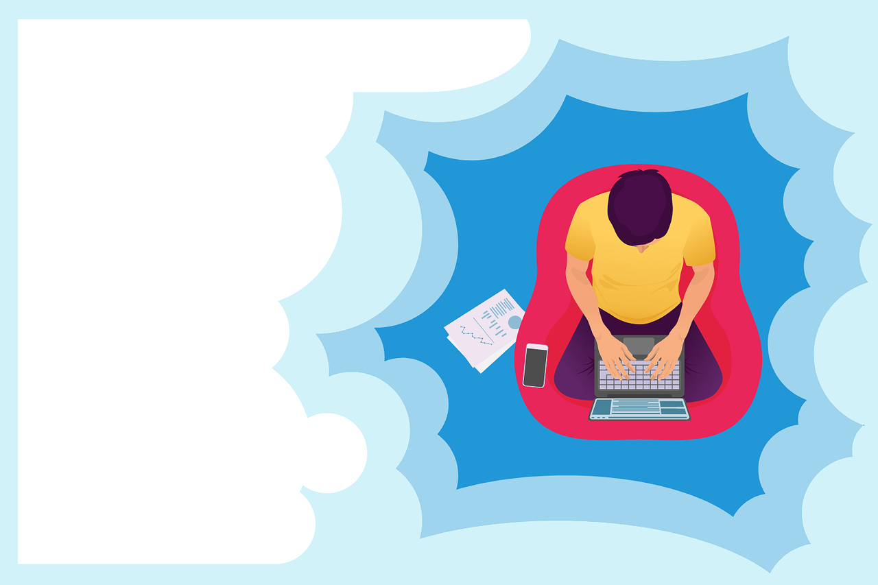 Person on laptop from top view
